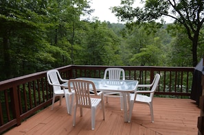 back deck with table and chairs