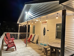 Welcome to Conched Out.  Enjoy our roomy ocean view deck... day or night!