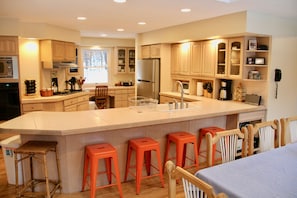 The kitchen counter is a great place for gathering to hang out