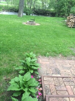 looking from the deck to the firepit and LaCrosse River