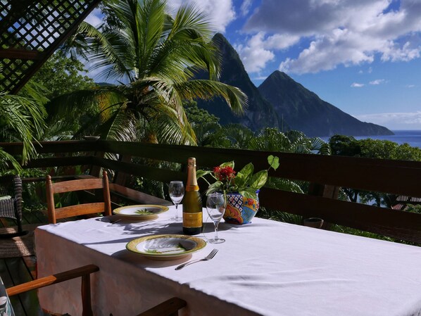 Dinning on the Treehouse II deck overlooking the Pitons and ocean is heavenly!