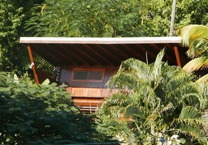 The Treehouse II is tucked into the treeline giving you the bird's eye view .