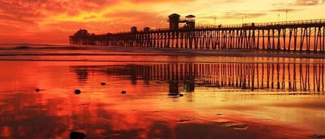 The Oceanside Municipal Pier at sunset. The pier is 1/2 mile South of our unit.