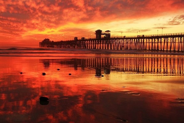 The Oceanside Municipal Pier at sunset. The pier is 1/2 mile South of our unit.