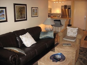 Our top grain leather sofa, Balinese side chair, and Balinese cube tables.