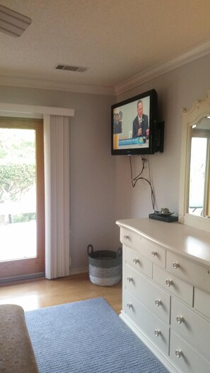 First Floor Master King Bedroom Suite with access to deck.  Large Flat Screen TV