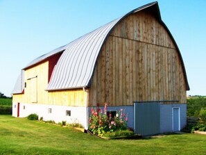 Enjoy the rural setting and beautiful barn and tobacco shed.