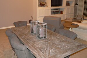 New distressed wood dining room table and 6 padded chairs