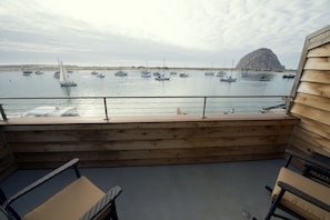 Your balcony offers amazing views of the harbor, ocean, and Morro Rock.