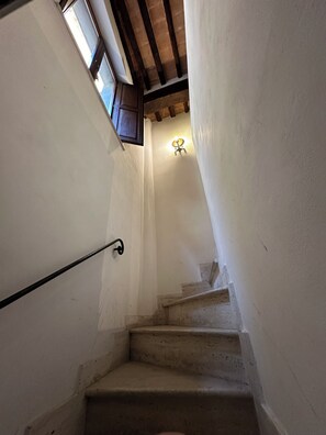Inside a few steps lead up to the main floor