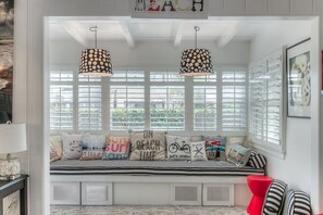 Large window seat at Front door entrance. A great place to curl up with a book.