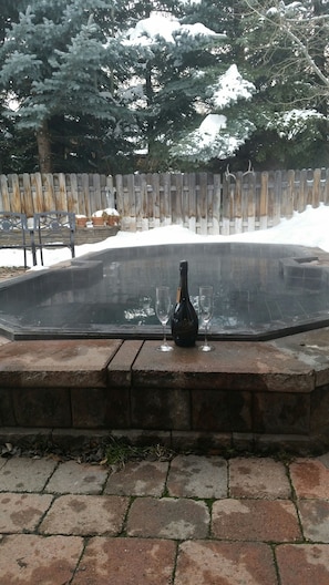 hot tub in winter from french doors