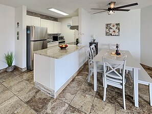 Beautiful upgraded kitchen enticing you to open a nice bottle of wine or mix a tropical drink.