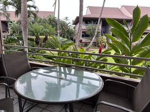 Relax and take in stunning views from this spacious lanai, perfect for outdoor lounging.