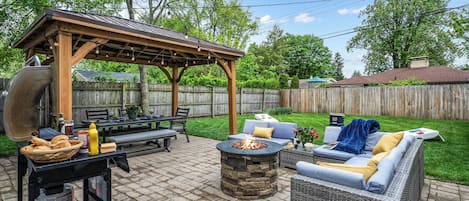 Private, fenced, backyard oasis with Gazebo, Gas Fire Pit and Grill, & much more