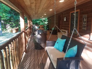 Covered front porch swing