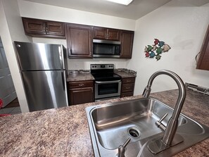 A bright and airy kitchen with island decor, perfect for entertaining or casual cooking.