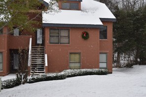Unit at top of stairs to the left. Bridge in the woods? That is the ski trail ! 