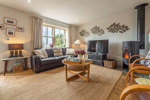 Ground floor: Sitting room with wood burning stove