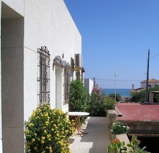 Terrace bungalow, sleeps 4-5, 50 m from the sandy beach & close to the centre