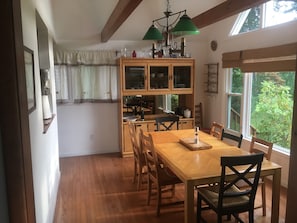 Dining room. Great views of lake. Dining table sits 8 to 10 adults.