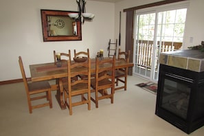 Dining Area: Nine chairs available (fireplace to the right).