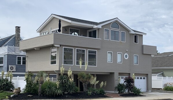 Location, location, location. Oceanside luxury. Ten houses away from the beach.