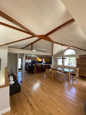 Hardwood hickory floors, beamed cathedral ceilings open loft concept