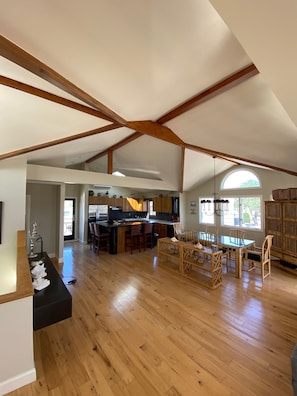 Hardwood hickory floors, beamed cathedral ceilings open loft concept