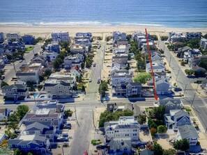 Follow red arrow to locate property. Easy walk to beach.