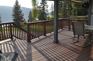 Large Covered Deck with Outdoor Furniture and BBQ
