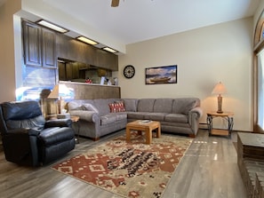 Spacious Living Room with Fireplace, Flat Screen TV and Lake Views