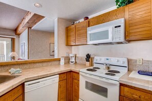 The kitchen comes equipped with everything you need.