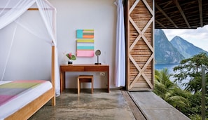 All bedrooms have a wall open to the elements, louvered doors and curtains