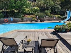 There are 4 lounge chairs and plenty of pool towels provided.