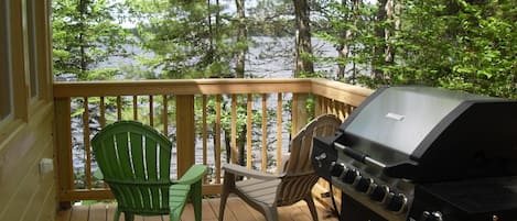 Grill on deck overlooking pond, with nice spot for coffee or cocktail