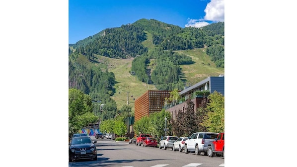 View from condo complex parking lot of Aspen Mountain and the Aspen Art Museum
