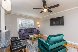 Spacious living room with SMART tv.