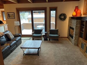 Living Room opens to back deck with view of Keystone Mountain and Tennis meadow