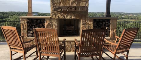 Outdoor fireplace with great hill country view! 
