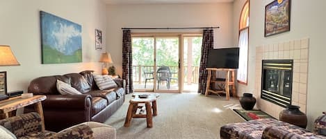 Cozy Living Room with a large deck in the back