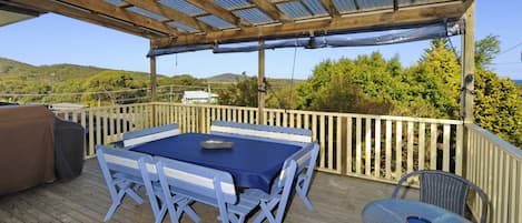 spacious front deck with views to the beach and ocean