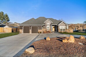 Front of the house.  Welcoming circular driveway.