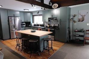 Newly renovated kitchen with new stainless appliances.