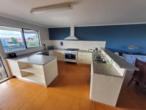 Spacious kitchen well equipped & stocked  (spices, sauce, breaky spreads)