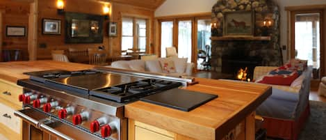 From Kitchen to Great Room and Glorious Fireplace - Huge Screened Porch  beyond