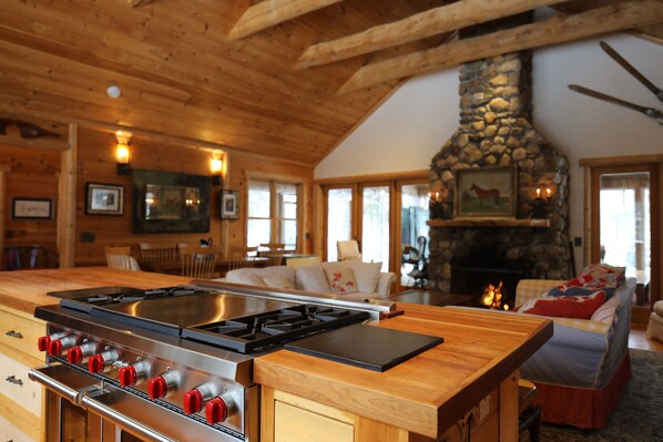 From Kitchen to Great Room and Glorious Fireplace - Huge Screened Porch  beyond