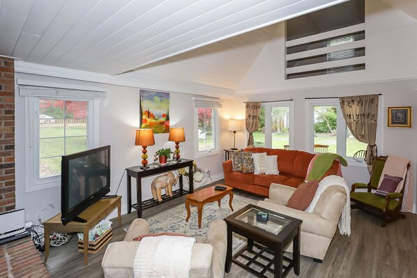A spacious main sitting room, awaits you.
