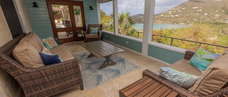 Screened in porch overlooking Fish Bay