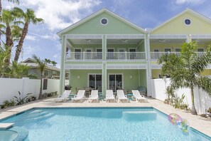 Backyard featuring private heated pool and hot tub!